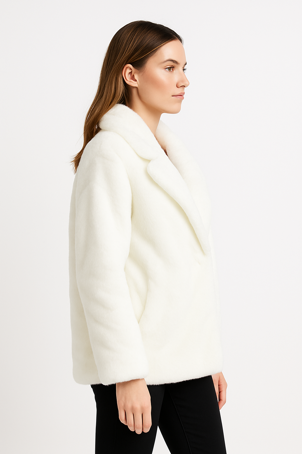 Woman wearing white Hazel extra thick faux fur coat with a relaxed fit and soft texture