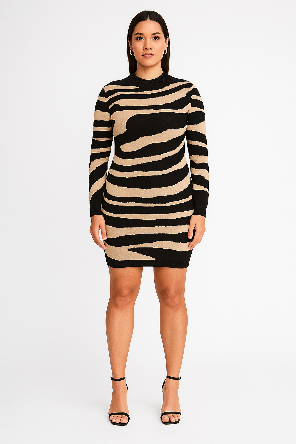 Woman wearing zebra print bodycon knitted dress with long sleeves and round neckline, styled with black high heel sandals